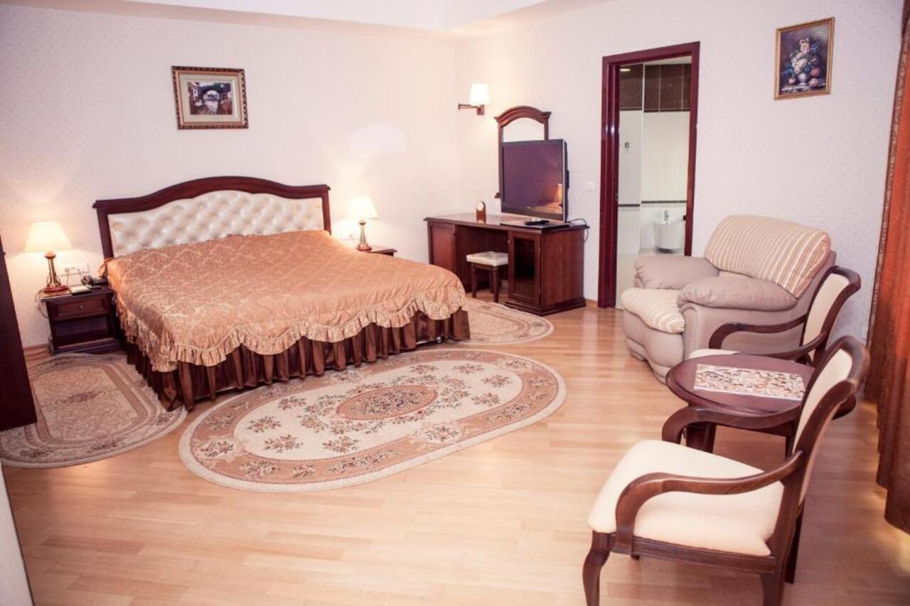 Grand Hotel Victory Актау Екстериор снимка A bedroom