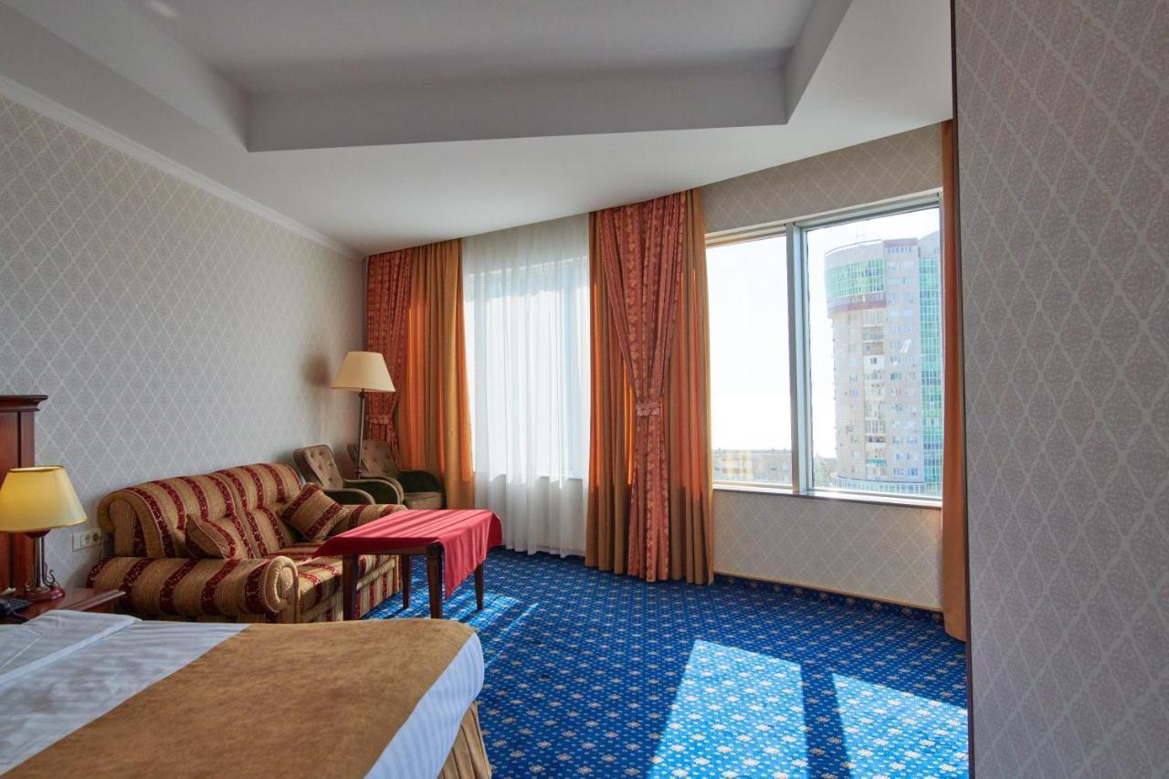 Grand Hotel Victory Актау Екстериор снимка A room at the hotel