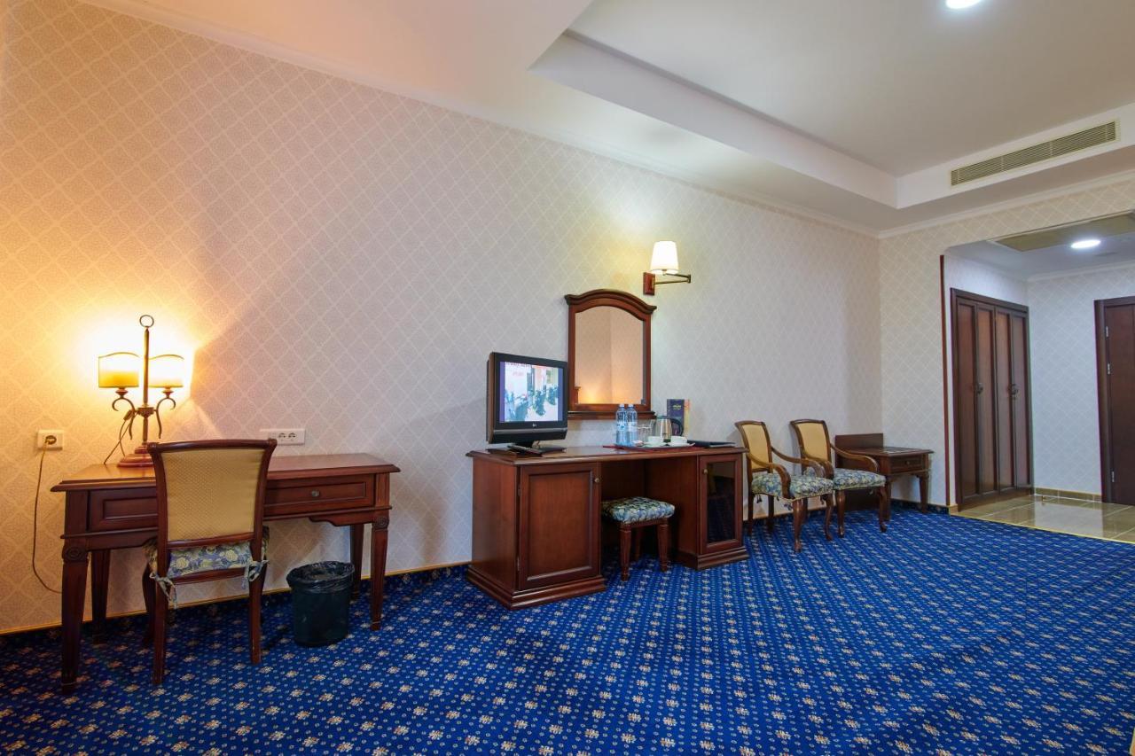 Grand Hotel Victory Актау Екстериор снимка A room at the hotel