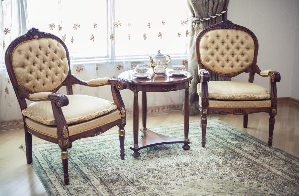 Grand Hotel Victory Актау Екстериор снимка A carpet in a living room